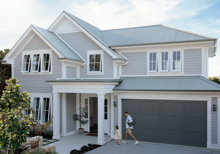 Modern Hamptons-style home featuring a durable COLORBOND® steel roof in Windspray® finish